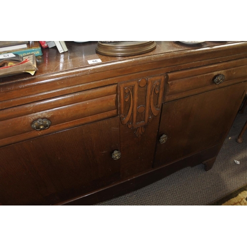 66 - A stunning mirrored back side board with decorative fittings and carvings produced by Lebus Furnitur... 