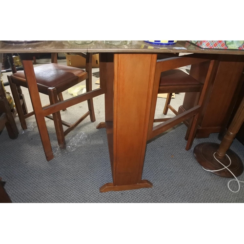 71 - A retro drop leaf table.