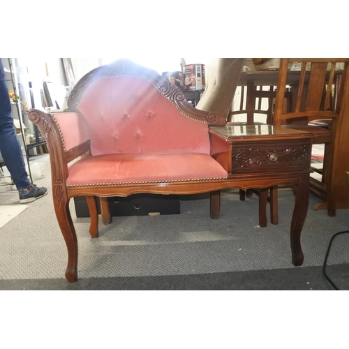 86 - A retro telephone table with decorative detailing.