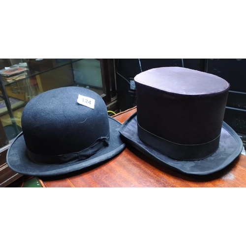 124 - A vintage top hat along with a bowler hat.
