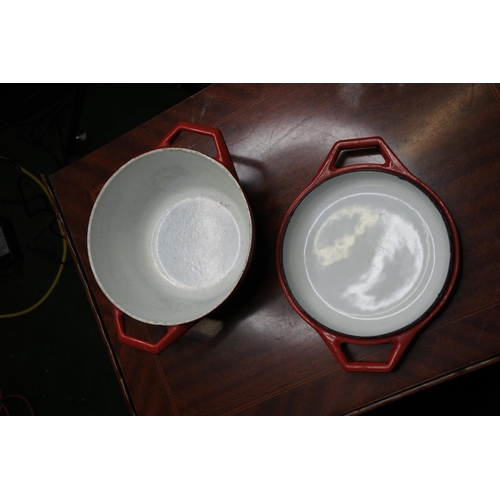 126 - A vintage Nacco Denmark lidded cast iron cooking pot.