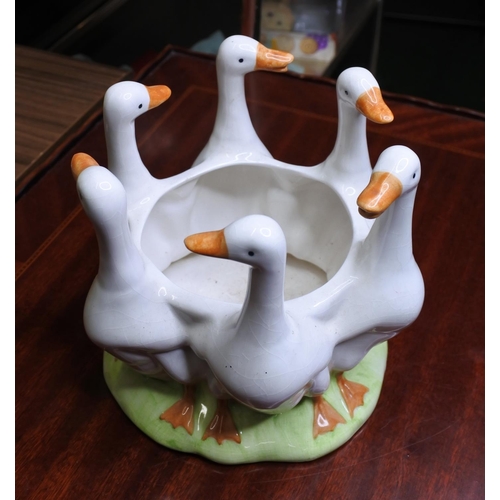 130 - A ceramic planter with in the shape of six ducks.