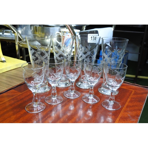 134 - A collection of vintage edge-glass drinking glasses.