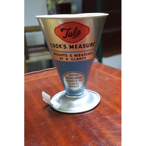 142 - A retro Tala Cook's Measure.