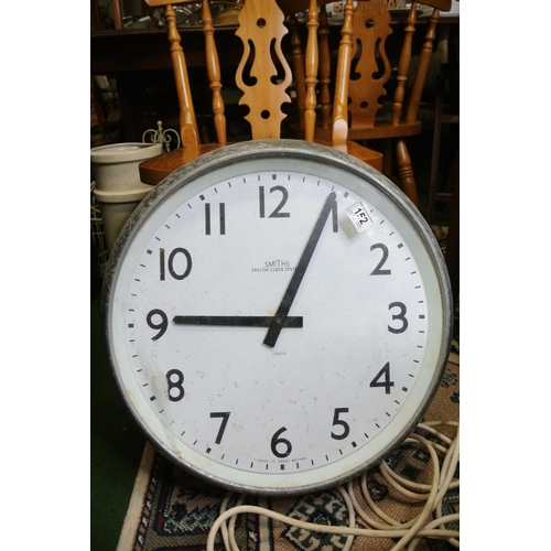 152 - A large Smiths English Clock System London wall clock.