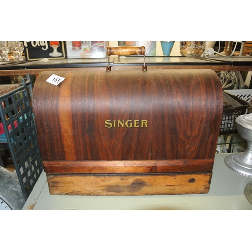 155 - A wood cased table top Singer sewing machine.