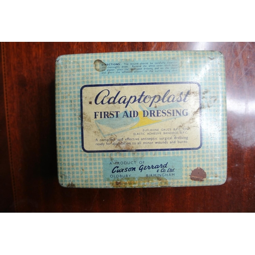 157 - Two vintage advertising tins along with an assortment of lighters.