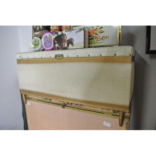 166 - A wicker ottoman.