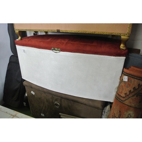 168 - A wicker ottoman.