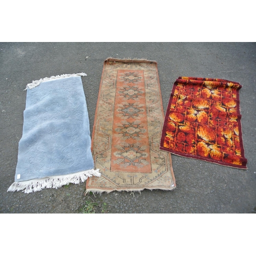 170 - Three floor rugs.