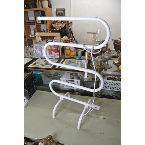 171 - A heated towel rack.