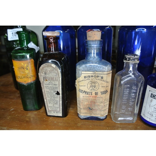 180 - An assortment of antique / vintage bottles to include, 'Bishop's Granular Effervescent', 'Gordon's S... 