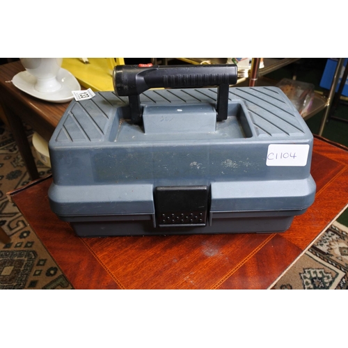 133 - A tackle box and contents to include a two Shakespeare reels, a Sunshine reel, and more.