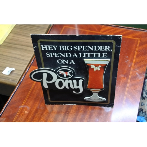 136 - An advertising card bar display, reading 'Hey big spender, spend a little on a pony'.