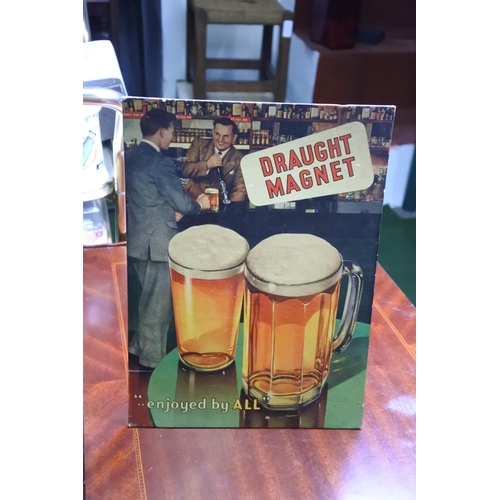 140 - An advertising card bar display, reading 'Draught Magnet... enjoyed by all'.