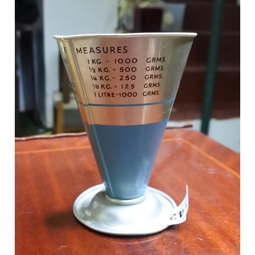 142 - A retro Tala Cook's Measure.