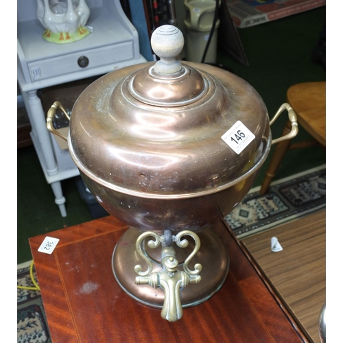 146 - An antique / vintage copper and brass samovar / drinks dispenser.