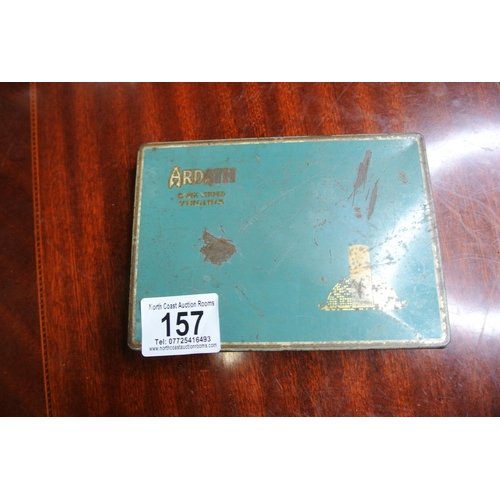 157 - Two vintage advertising tins along with an assortment of lighters.