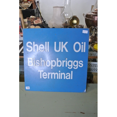 174 - A metal sign, reading 'SHELL UK OIL - BISHOPBRIGGS TERMINAL'.