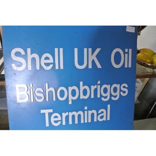 174 - A metal sign, reading 'SHELL UK OIL - BISHOPBRIGGS TERMINAL'.