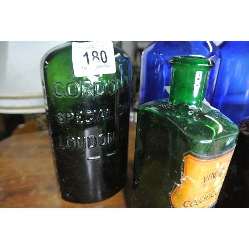 180 - An assortment of antique / vintage bottles to include, 'Bishop's Granular Effervescent', 'Gordon's S... 