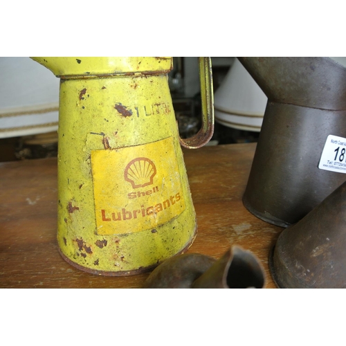 181 - A Shell Lubricants oil can, another oil can and two funnels.