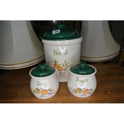 245 - A Cloverleaf 'Peaches and Cream', ceramic beard bin, tea jar, and sugar jar.