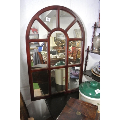 246 - An arch top mirror.