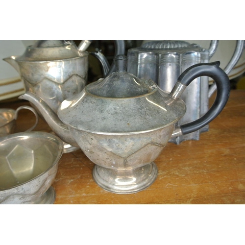 250 - An assortment of silver plate items to include two teapots, a coffee pot, sugar bowl and milk jug.