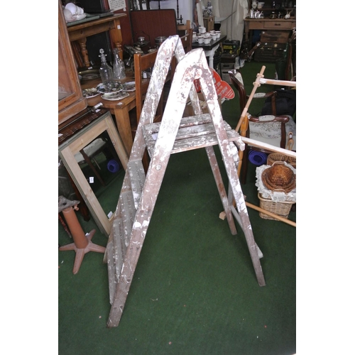 255 - A wooden step-ladder.