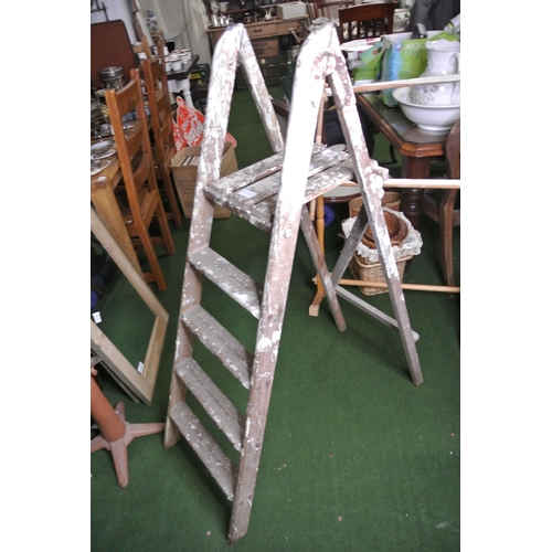 255 - A wooden step-ladder.