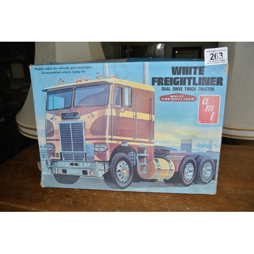 263 - A White Freightliner Dual Drive Truck Tractor un-assembled vehicle hobby kit.