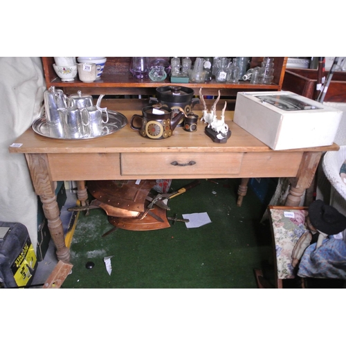 273 - A large pine table with drawer.