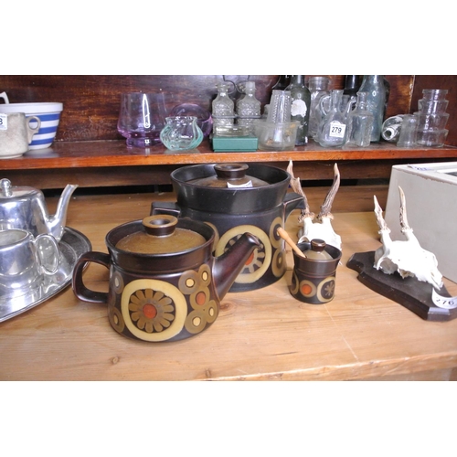 275 - A retro set of Denby ceramics to include a teapot, provinces pot and lidded pot.