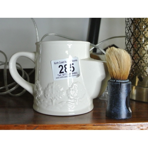 285 - A Manson's Ironstone embossed shaving mug for Crabtree & Evelyn London, along with a shaving brush.