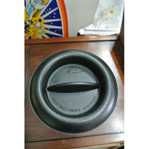 488 - A Tia Maria ice bucket along with a Vacuvin wine cooler.