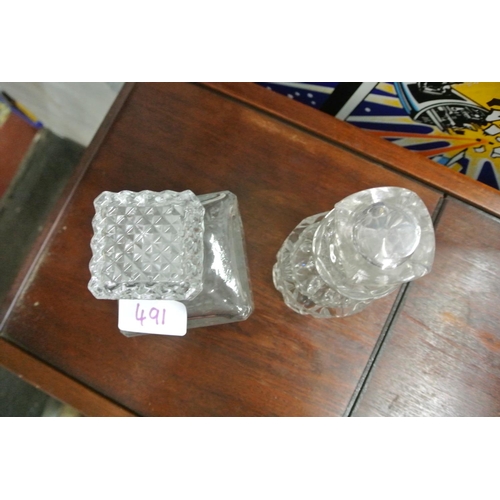 491 - Two cut glass decanters.