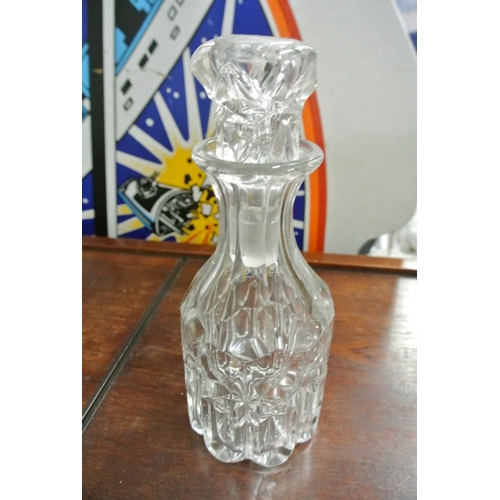 491 - Two cut glass decanters.