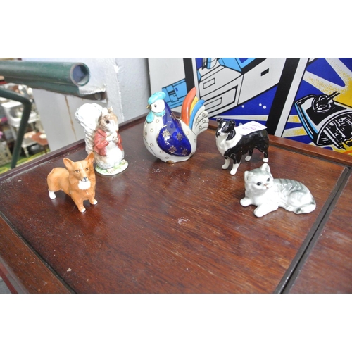 496 - An assortment of ceramic figures to include makers such as, 'Beswick', 'Bellwood', and more.