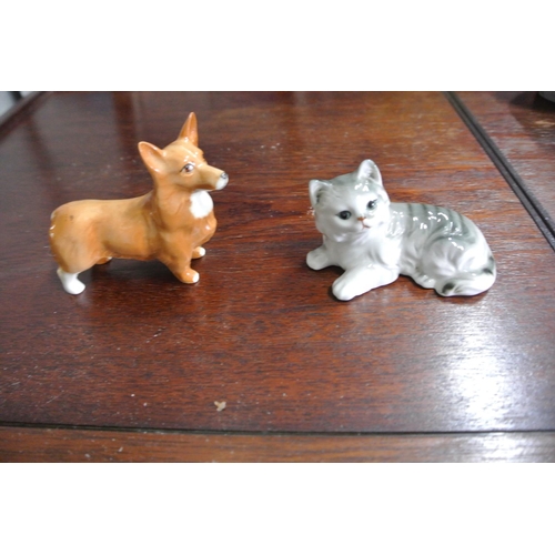 496 - An assortment of ceramic figures to include makers such as, 'Beswick', 'Bellwood', and more.