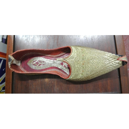 505 - A pair of vintage shoes.