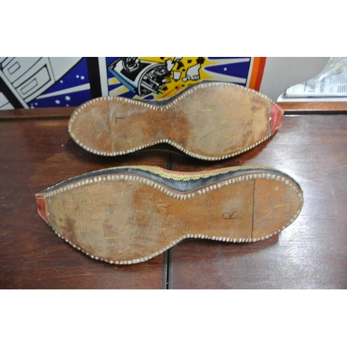 505 - A pair of vintage shoes.