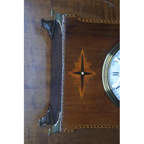 118 - A small wooden antique clock with brass finishings and mother of pearl detail. a/f