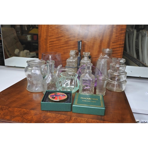 125 - A large assortment of glassware.