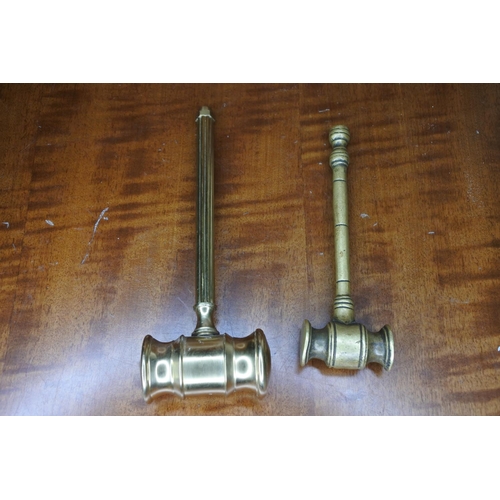 205 - Two brass gavels.