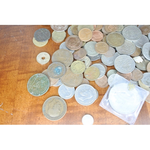 21 - An assortment of various coinage.