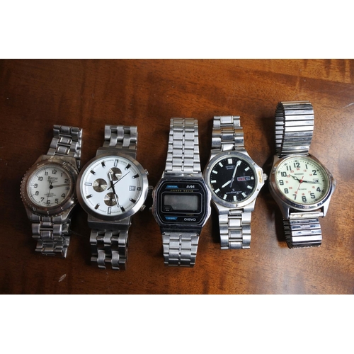 223 - A large collection of wrist watches.