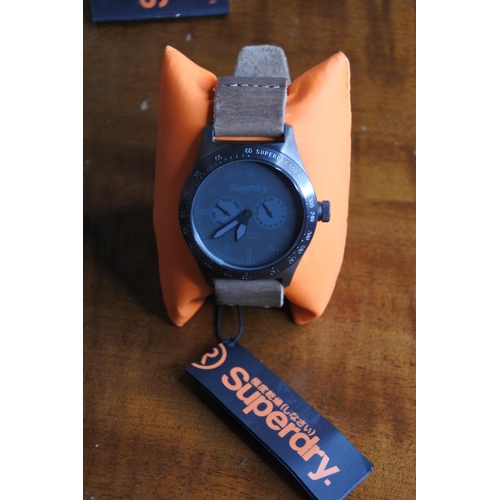 231 - A Superdry gents wrist watch with original box and instructions.