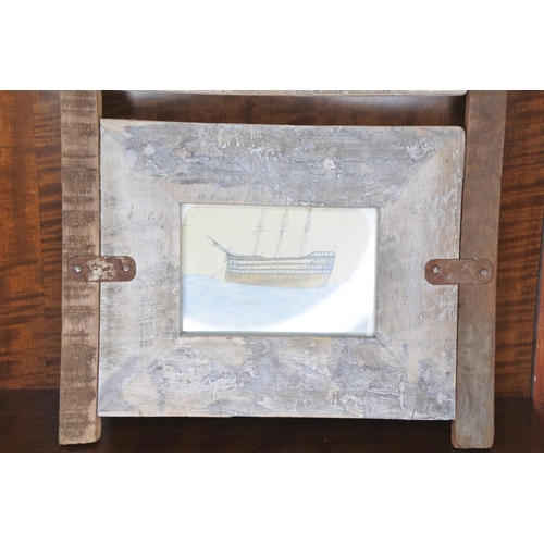 33 - A handcrafted picture frame.