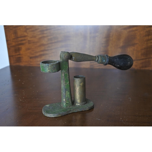 67 - An antique shotgun cartridge reloading tool.